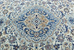 Central medallion detail of 2000s Nain rug from Iran / Persia