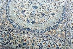 Close-up detail of 2000s Nain rug from Iran / Persia showing Wool weave