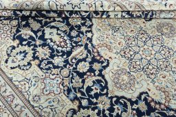 Close-up detail of 2000s Nain rug from Iran / Persia showing Wool weave