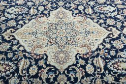 Central medallion detail of 2000s Nain rug from Iran / Persia
