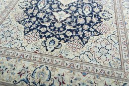 Close-up detail of 2000s Nain rug from Iran / Persia showing Wool weave