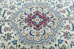 Central medallion detail of 2000s Nain rug from Iran / Persia