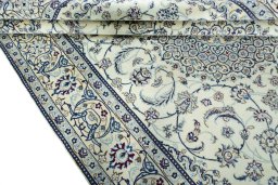 Close-up detail of 2000s Nain rug from Iran / Persia showing Wool weave