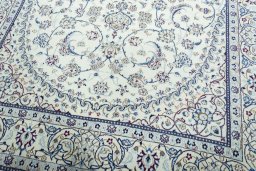Close-up detail of 2000s Nain rug from Iran / Persia showing Wool weave