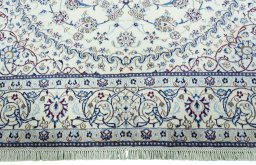 Full view of 2000s Nain rug from Iran / Persia, 304 × 205 cm in Beige tones