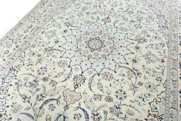Backside of handmade 2000s Nain rug showing knot structure and weave density