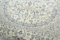 Close-up detail of 2000s Nain rug from Iran / Persia showing Wool weave