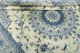 Close-up detail of New Nain rug from Iran / Persia showing Wool weave