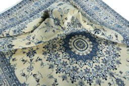 Surface texture of New Nain rug with natural Wool and intricate pattern