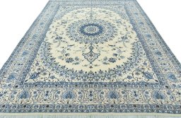 Surface texture of New Nain rug with natural Wool and intricate pattern