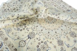 Surface texture of New Nain rug with natural Wool and intricate pattern