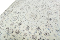 Backside of handmade New Nain rug showing knot structure and weave density