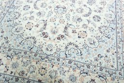 Close-up detail of New Nain rug from Iran / Persia showing Wool weave