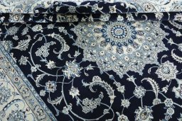 Close-up detail of New Nain rug from Iran / Persia showing Wool weave