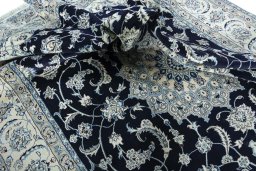Surface texture of New Nain rug with natural Wool and intricate pattern