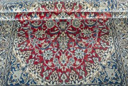 Corner detail of New Nain rug showing border pattern and Wool pile
