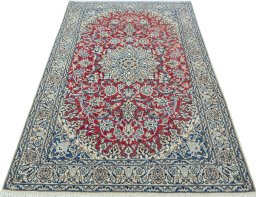 Surface texture of New Nain rug with natural Wool and intricate pattern