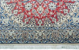 Close-up detail of New Nain rug from Iran / Persia showing Wool weave