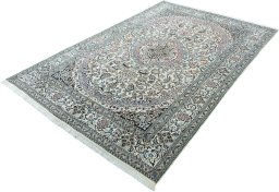 Corner detail of 2000s Nain rug showing border pattern and Wool pile