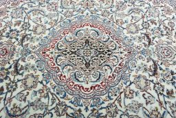 Central medallion detail of 2000s Nain rug from Iran / Persia