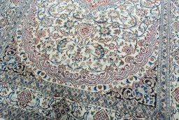 Close-up detail of 2000s Nain rug from Iran / Persia showing Wool weave