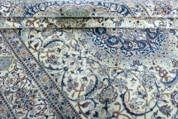 Close-up detail of 2000s Nain rug from Iran / Persia showing Wool weave