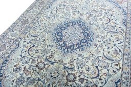 Backside of handmade 2000s Nain rug showing knot structure and weave density