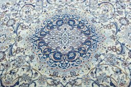 Central medallion detail of 2000s Nain rug from Iran / Persia