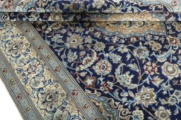 Close-up detail of 2000s Nain rug from Iran / Persia showing Wool weave