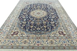 Surface texture of 2000s Nain rug with natural Wool and intricate pattern