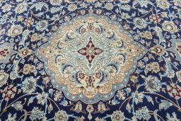 Central medallion detail of 2000s Nain rug from Iran / Persia