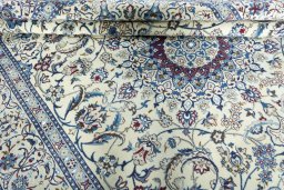 Close-up detail of 2000s Nain rug from Iran / Persia showing Wool weave