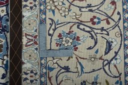 Backside of handmade 2000s Nain rug showing knot structure and weave density