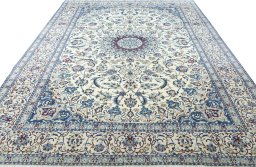 Surface texture of 2000s Nain rug with natural Wool and intricate pattern