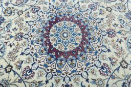 Central medallion detail of 2000s Nain rug from Iran / Persia