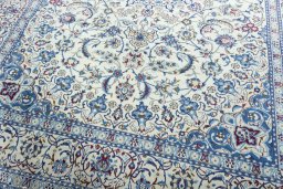 Close-up detail of 2000s Nain rug from Iran / Persia showing Wool weave