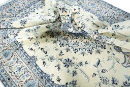 Surface texture of New Nain rug with natural Wool and intricate pattern