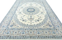 Surface texture of New Nain rug with natural Wool and intricate pattern