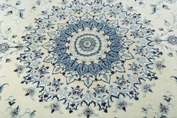 Central medallion detail of New Nain rug from Iran / Persia