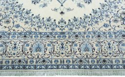 Full view of New Nain rug from Iran / Persia, 347 × 242 cm in Beige tones