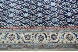 Close-up detail of New Nain rug from Iran / Persia showing Wool weave
