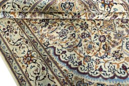 Close-up detail of 2000s Nain rug from Iran / Persia showing Wool weave