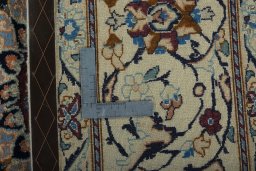 Backside of handmade 2000s Nain rug showing knot structure and weave density