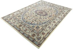 Corner detail of 2000s Nain rug showing border pattern and Wool pile