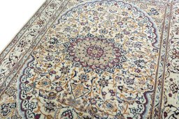 Backside of handmade 2000s Nain rug showing knot structure and weave density