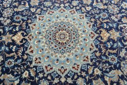 Central medallion detail of 2000s Nain rug from Iran / Persia