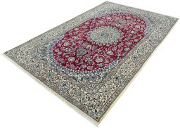 Corner detail of New Nain rug showing border pattern and Wool pile