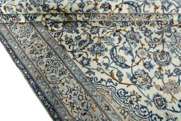 Close-up detail of 2000s Nain rug from Iran / Persia showing Wool weave