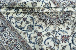 Close-up detail of 2000s Nain rug from Iran / Persia showing Wool weave