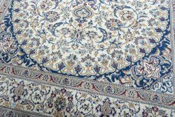 Close-up detail of 2000s Nain rug from Iran / Persia showing Wool weave